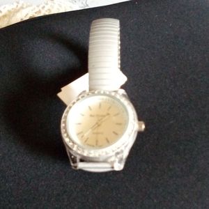 NWT Bay Studio Women Watch/stretch band /silver with rhinestones around the …